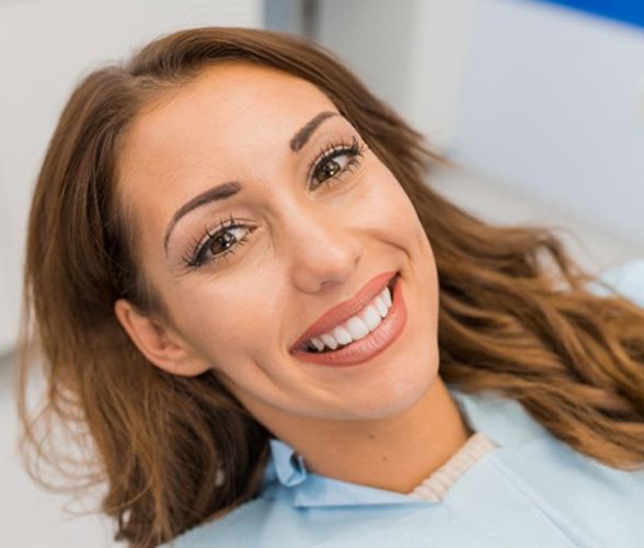 Smiling woman with beautiful, straight teeth