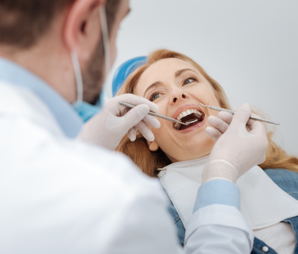 Periodontist treating patient