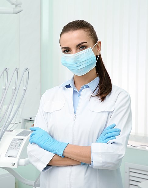 Periodontal team member wearing a protective face mask
